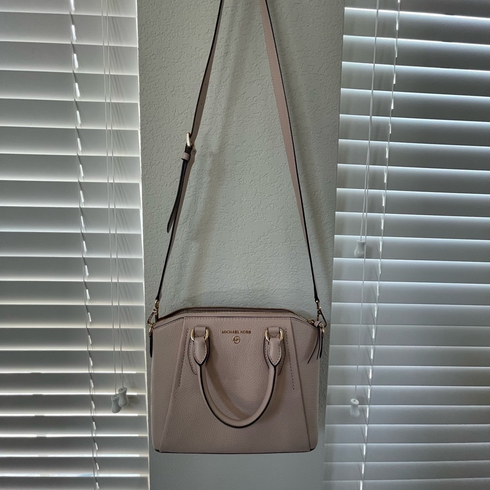 Michael Kors purse- beautiful and in great condition. Pink pebbled leather.